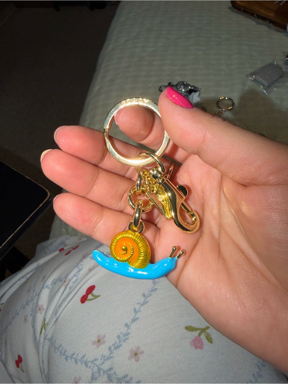 Coach Gold-tone Keychain with Blue & Yellow Snail Charm